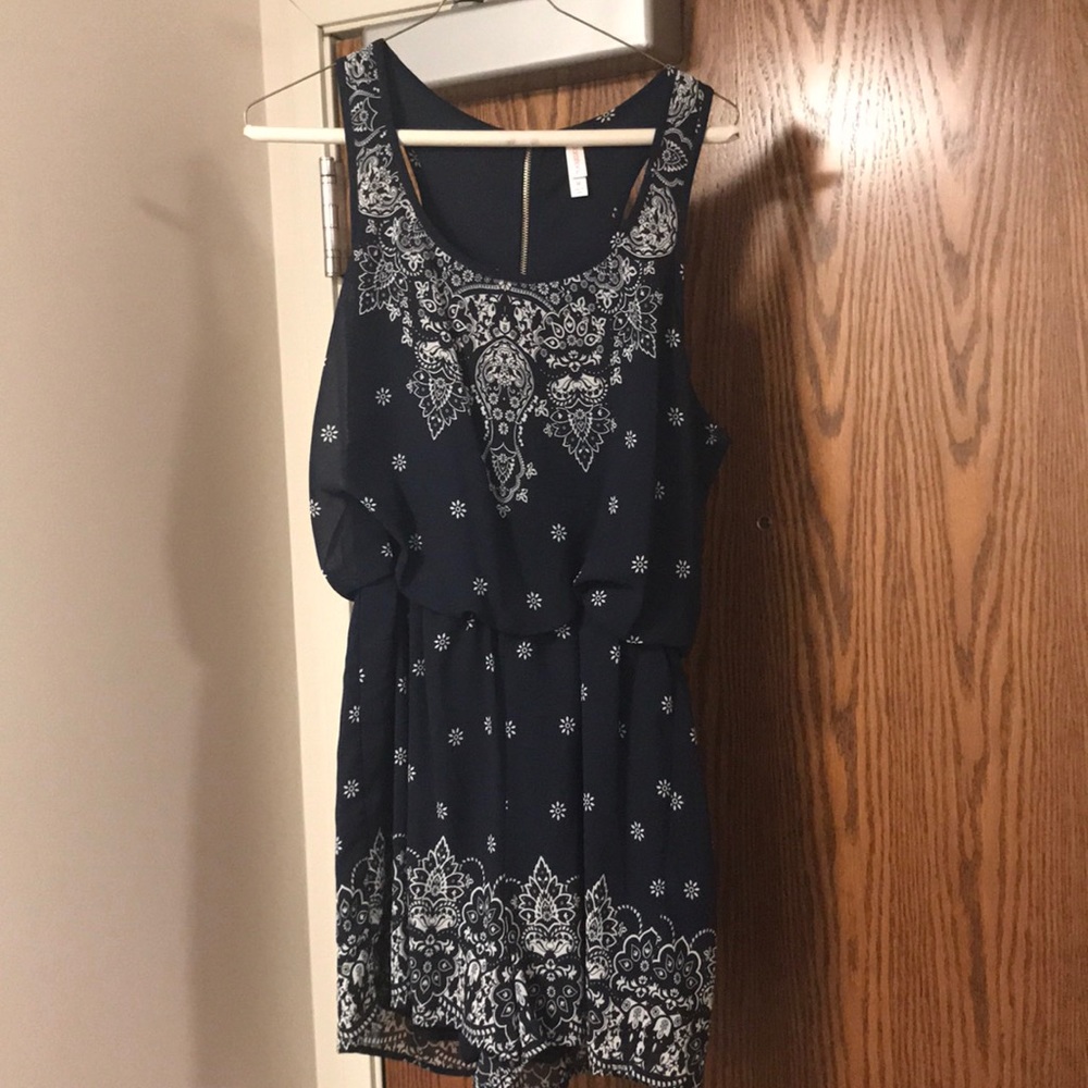 like new blue patterned romper